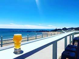 Image looking out over the ocean at Penguin Beer Co in Penguin Tasmania where we are performing in Feb 2024
